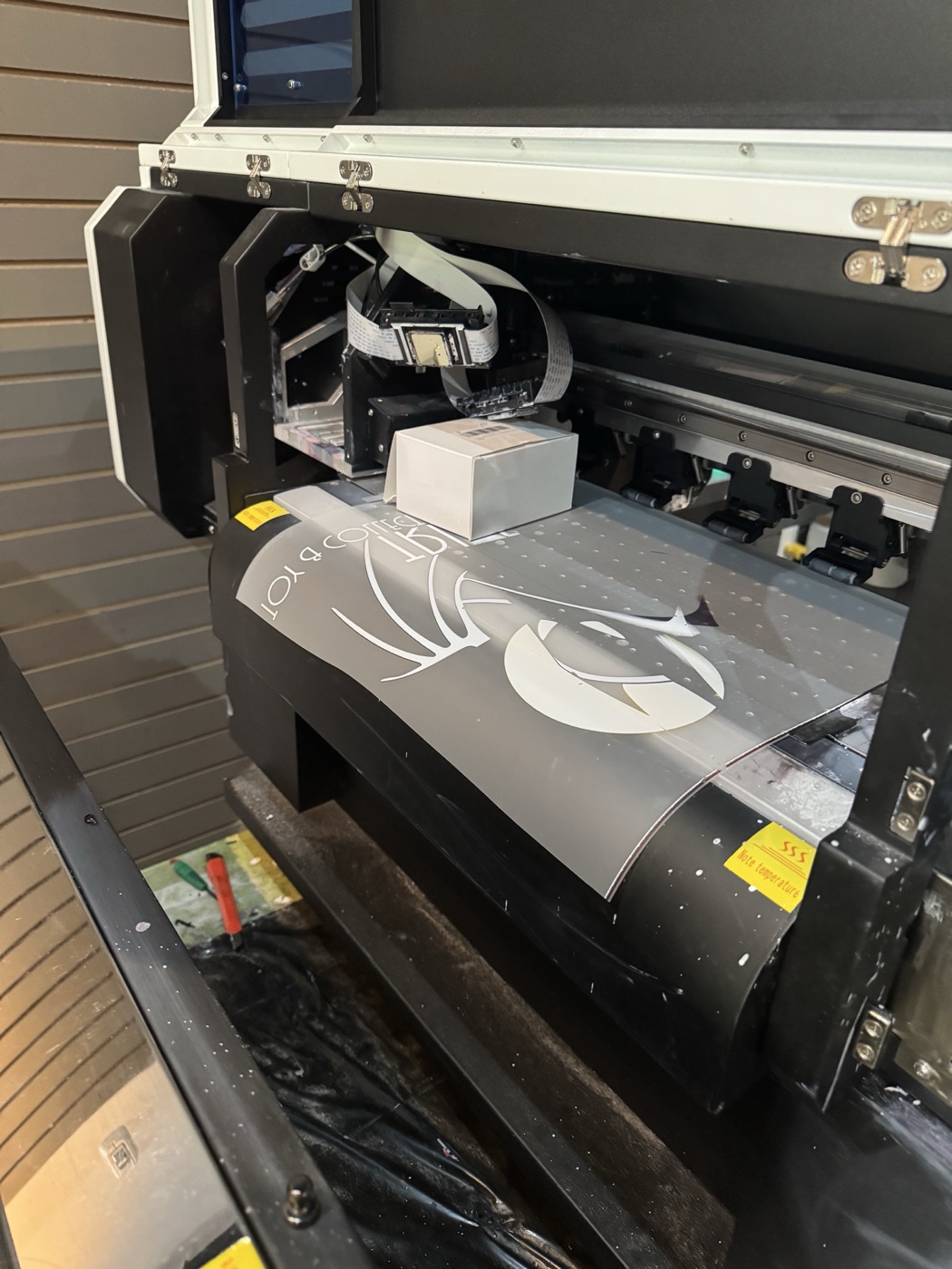 In-house custom printing machine at The RAD Studio in Stratford Ontario